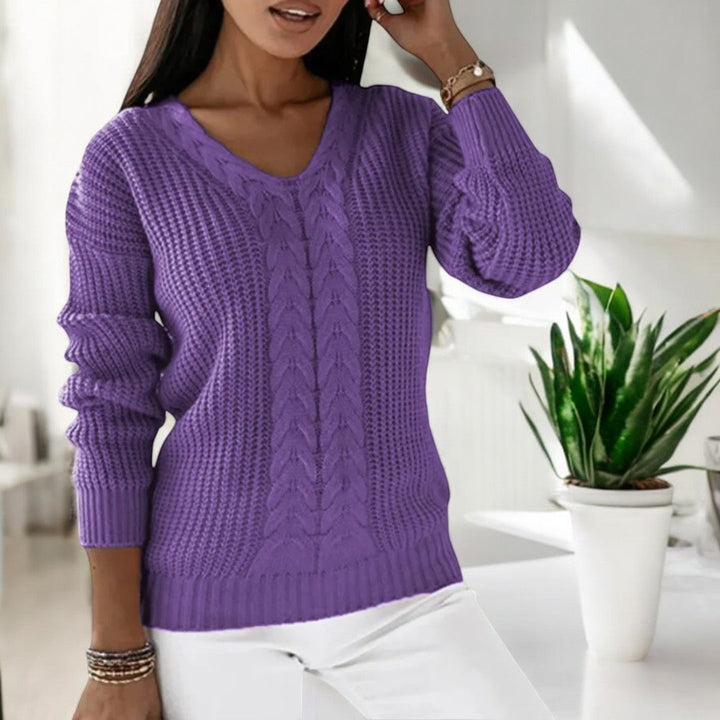 Modieuze herfst/winter damestrui met losse pasvorm, lange mouwen en elegante V-hals. Casual chic.