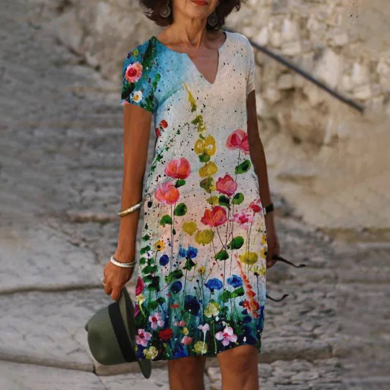Dames kleurrijke bloemen midi zomerjurk, perfect voor een comfortabele en elegante casual look.