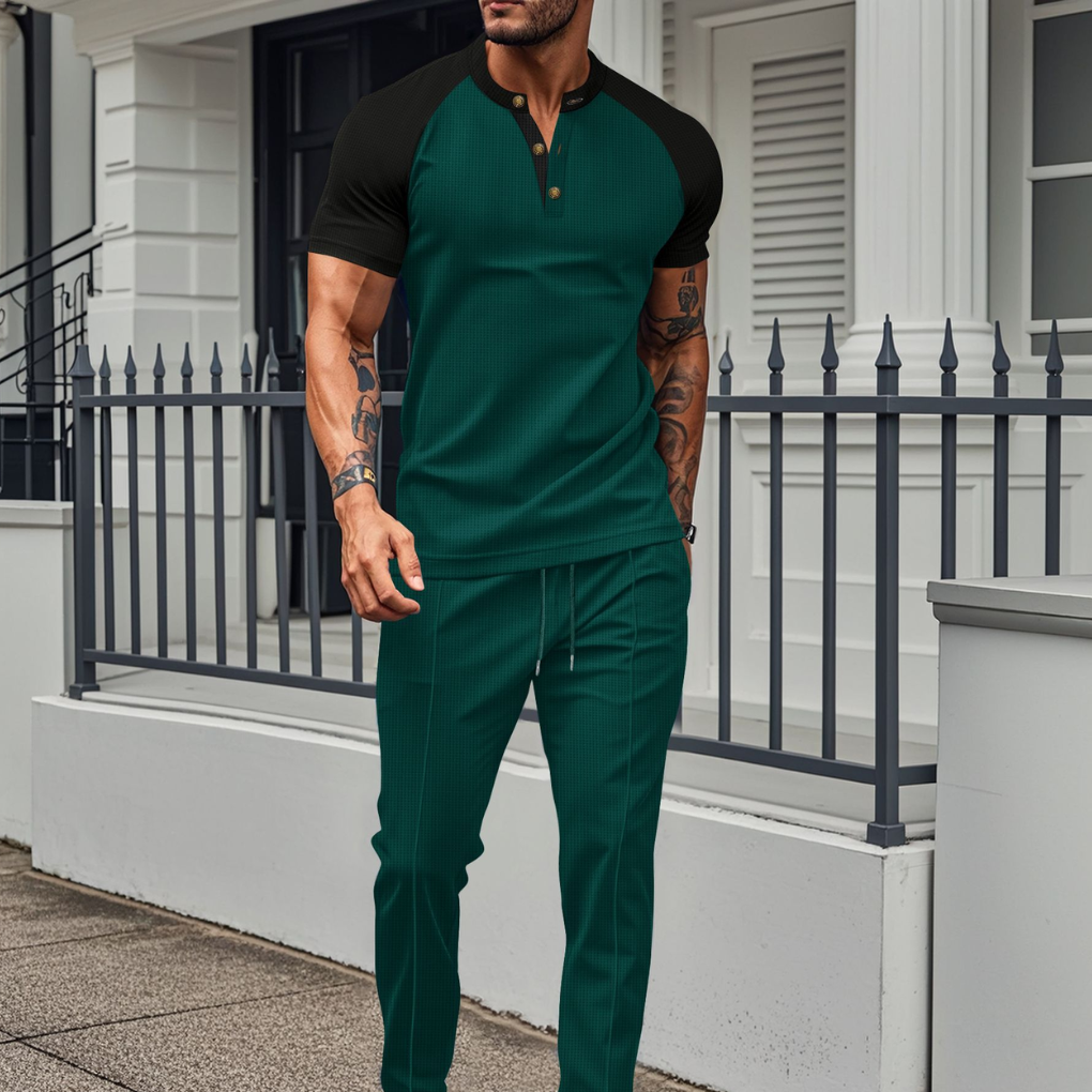 Modieus heren joggingpak; een casual outfit met stijlvol shirt en comfortabele joggingbroek voor dagelijks gebruik.