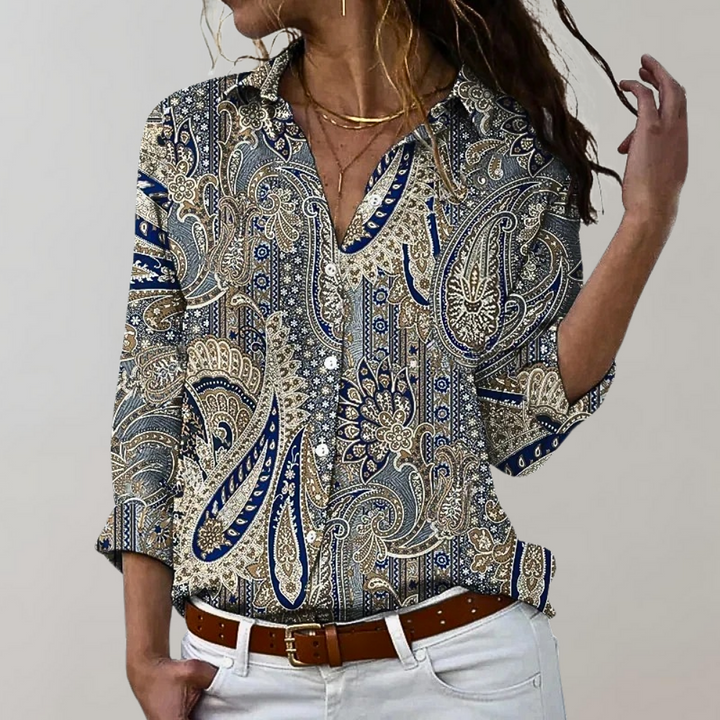 Modieuze damesblouse met een uniek printdesign en lange mouwen. Perfect voor een elegante en comfortabele look.