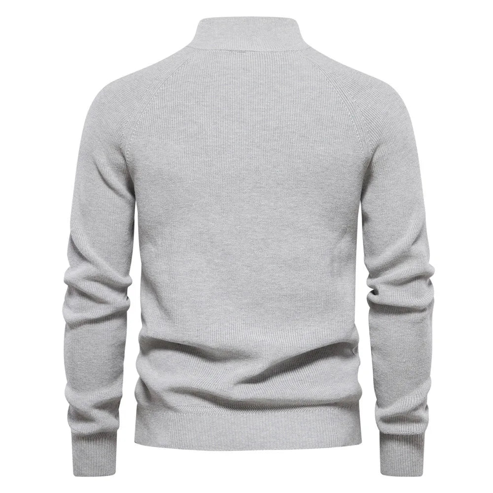 Comfortabele ribgebreide heren trui met halve rits en opstaande kraag, perfect voor de koudere dagen.