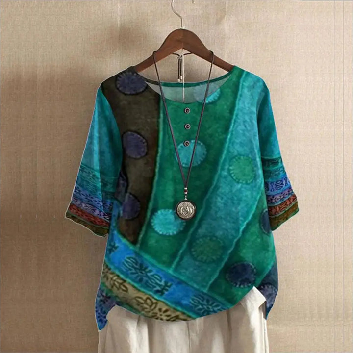 Stijlvolle dames top met ronde hals en driekwart mouw, ideaal voor comfort en veelzijdigheid. Ook verkrijgbaar in plus size.