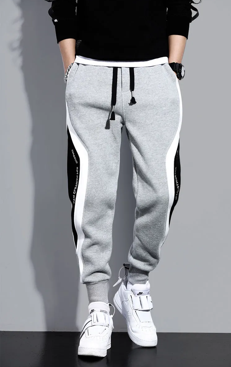 Veelzijdige heren sportbroek/joggingsbroek met patchwork, comfortabel voor dagelijks gebruik of training.