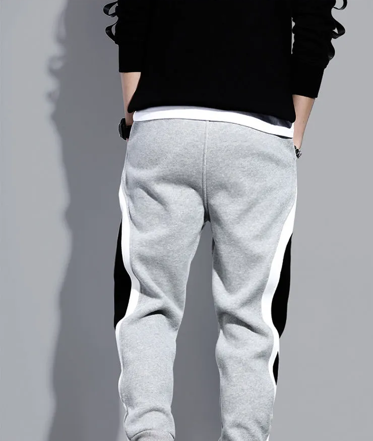Stijlvolle heren casualbroek, comfortabele joggingsbroek met uniek patchwork. Ideaal voor vrijetijd.