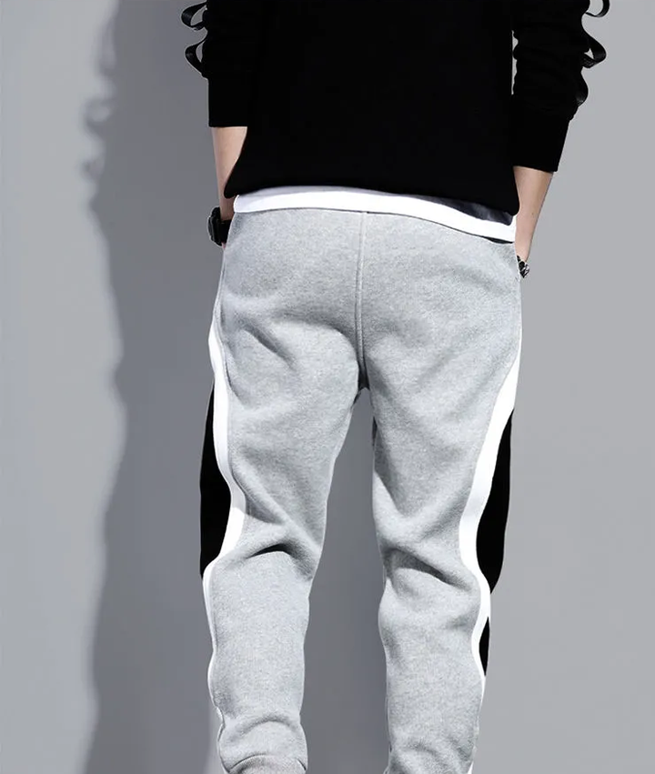 Stijlvolle heren casualbroek, comfortabele joggingsbroek met uniek patchwork. Ideaal voor vrijetijd.