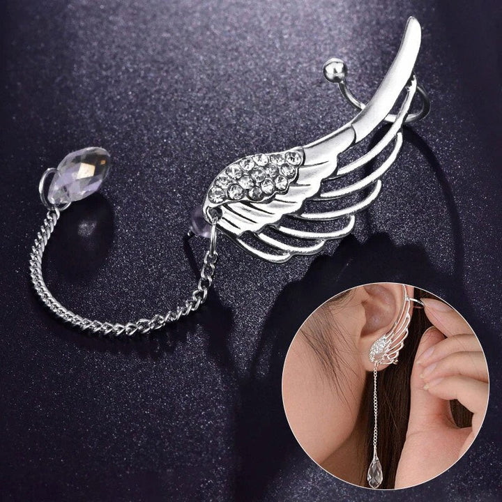 Dames zilverkleurige oormanchet met elegante engelenvleugel design. Perfecte mode accessoire.