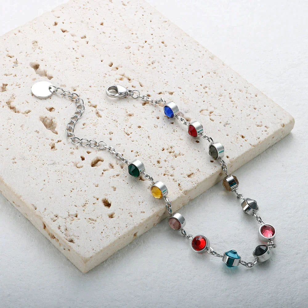 Perfect cadeau: kleurrijke regenboogkristal bedelarmband voor dames. Verstelbaar sieraad en trendy accessoire.