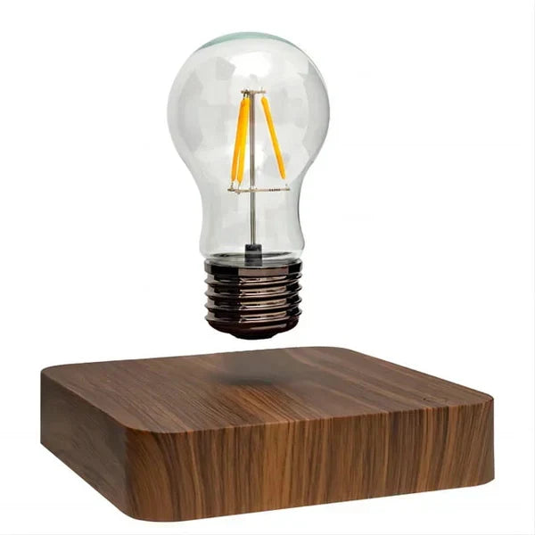 LevitaLux zwevende design lamp met walnoothout basis, creëert sfeervolle verlichting in woonkamer of slaapkamer.