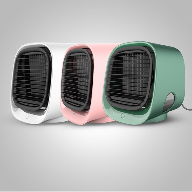 Groene draagbare mini luchtkoeler met bevochtiger voor frisse en koele lucht op warme dagen.