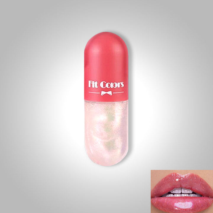 Dames mini lipgloss capsule voor glanzende, gehydrateerde lippen. Compacte make-up.