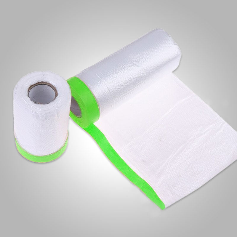Grote rol beschermfolie met afplaktape voor stofvrije renovatie. Essentiële schildersbenodigdheden.