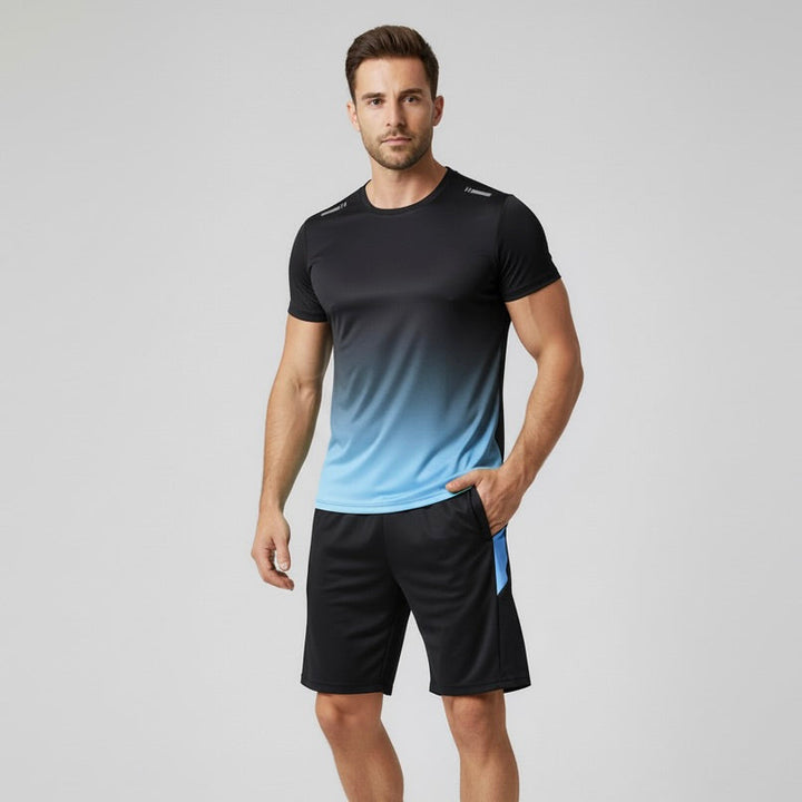Volledig heren sportpak, zwart. Biedt optimale bewegingsvrijheid en comfort voor diverse atletische trainingen.