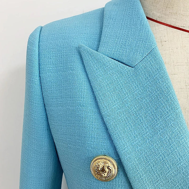 Veelzijdige dames blazer met lange mouwen, getailleerd en versierd met leeuwenknopen.