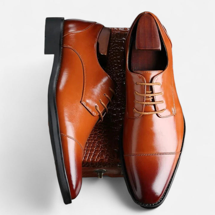 Hoogwaardige leren Oxford schoenen voor mannen, duurzaam en verfijnd, een essentieel item voor elke klassieke garderobe.