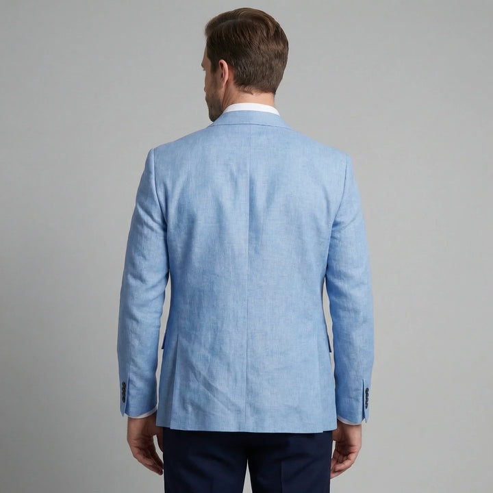 Beige heren blazer met stijlvolle revers en functionele voorzakken. Perfect voor lente-evenementen.