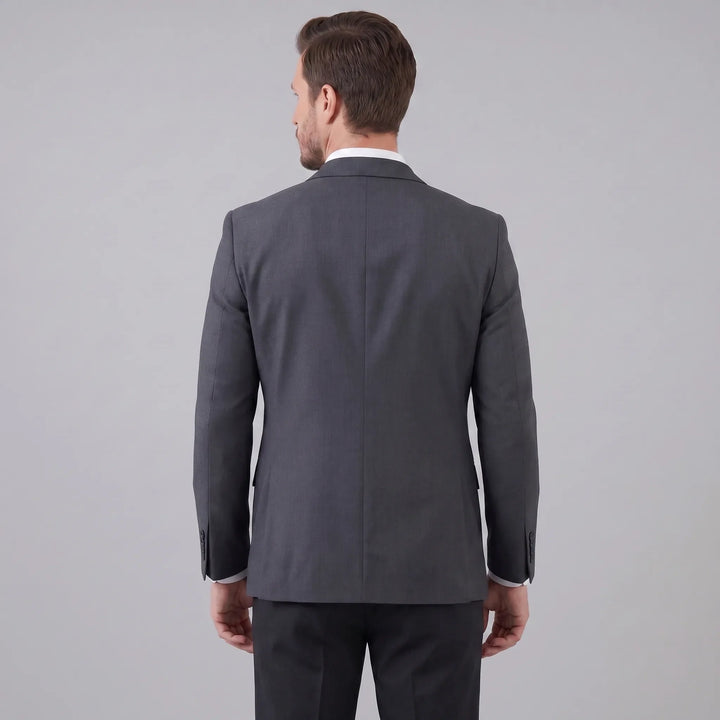 Donkerblauwe slim fit blazer voor heren; modern jasje voor kantoor of feestelijke evenementen.