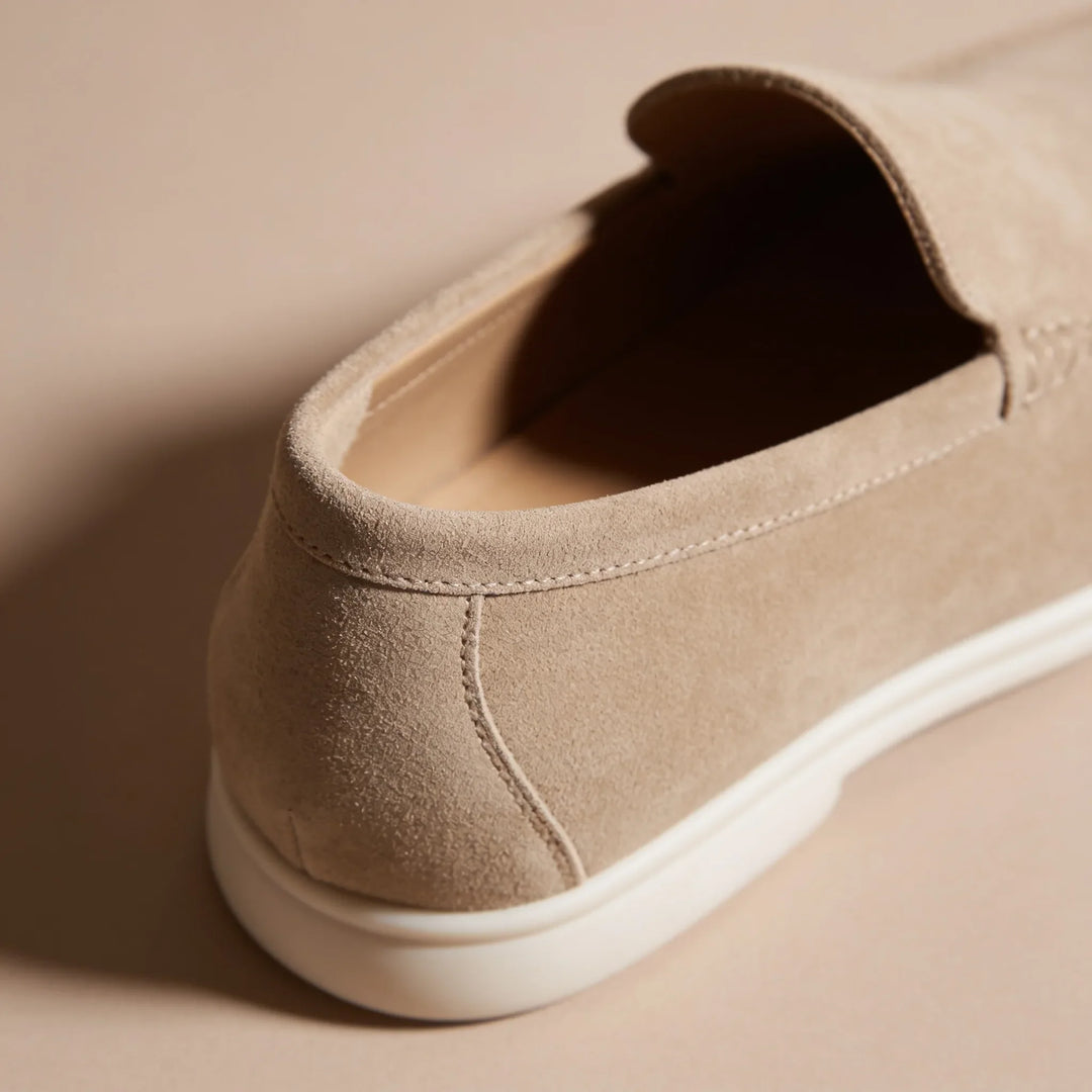 Donkerblauwe dames instappers, comfortabele casual schoenen met penny detail.