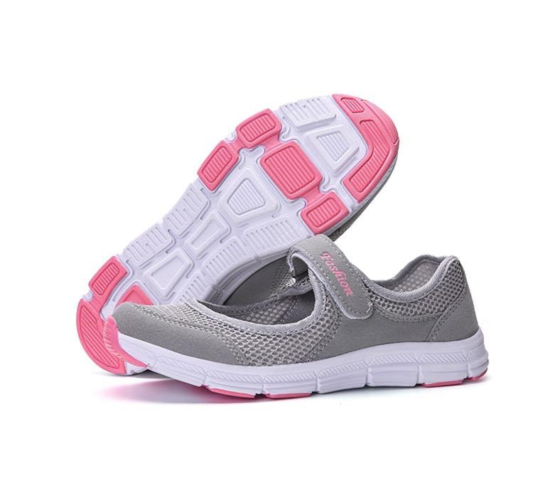 AirFlow dames instappers, zwart, met ademend mesh en handige klittenbandsluiting voor comfort.