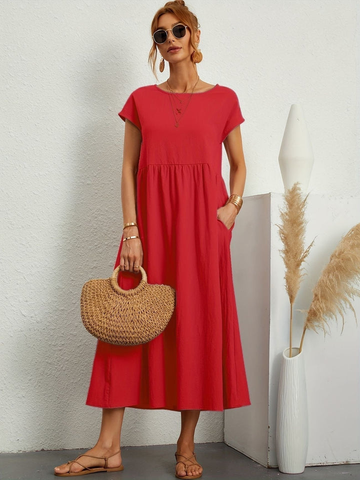 Casual dames midijurk met korte mouwen, ontspannen pasvorm, een must-have voor je zomergarderobe.