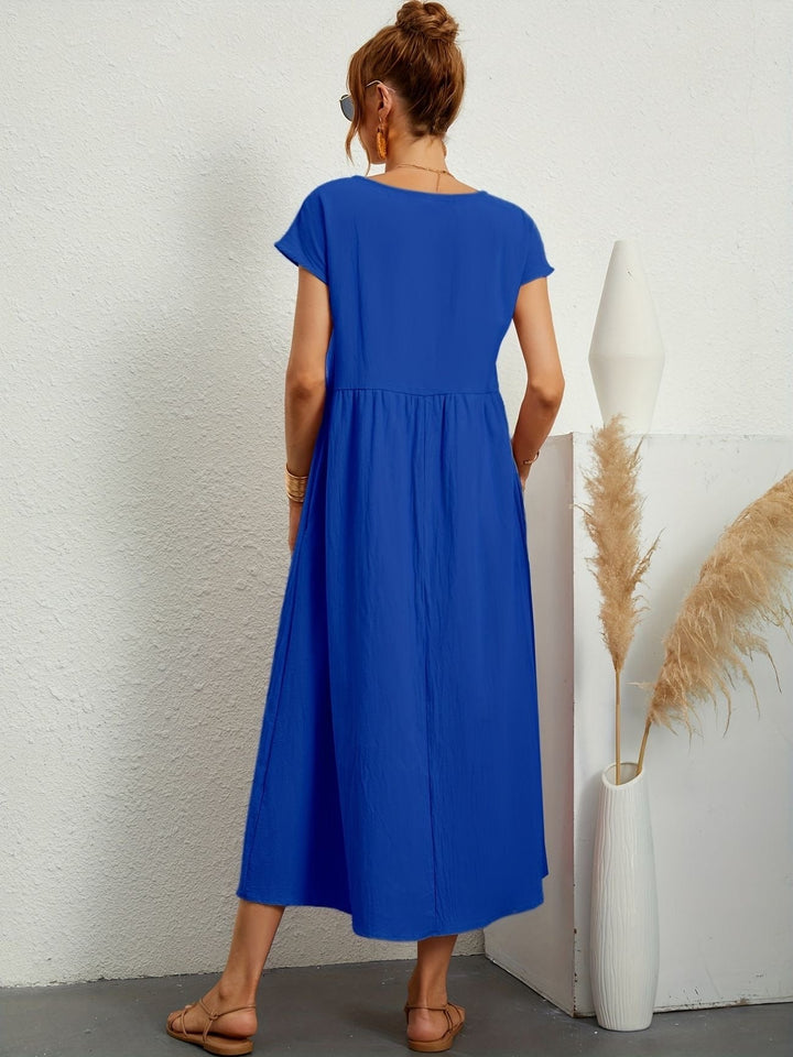 Veelzijdige dames midijurk met korte mouwen, comfortabel en elegant, van casual tot gekleed.