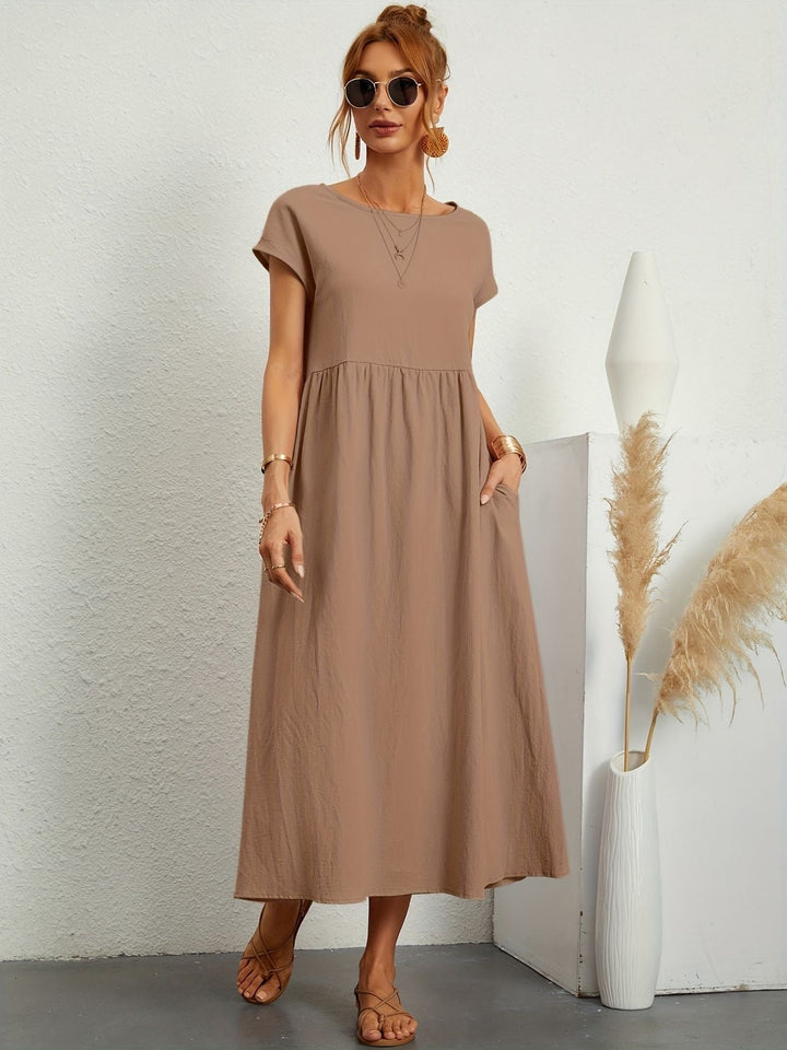 Elegante midijurk dames met korte mouwen, A-lijn silhouet, een comfortabele en veelzijdige toevoeging.