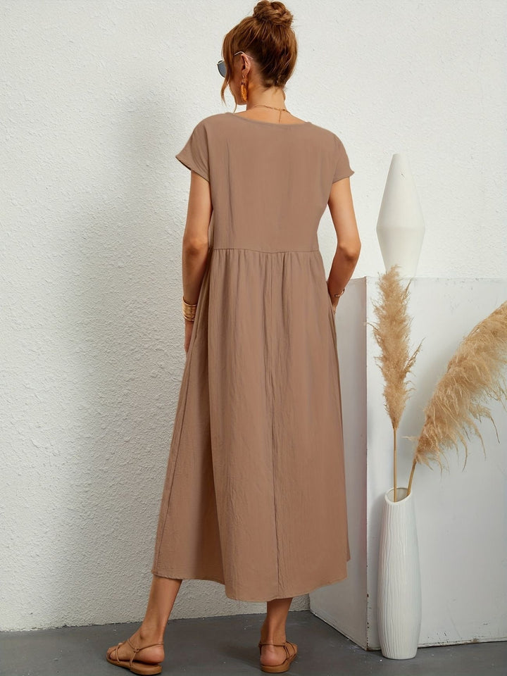 Casual midijurk voor dames, korte mouwen, ontworpen voor ultiem comfort en een moderne uitstraling.