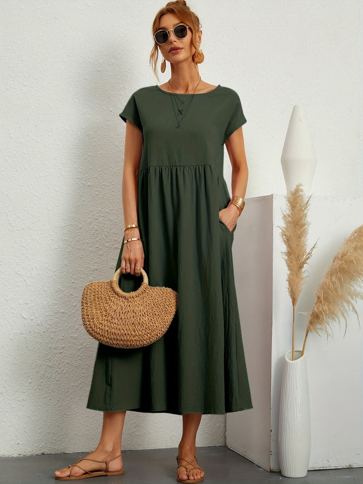 Damesjurk midi met korte mouwen, comfortabel en stijlvol, perfect voor een elegante casual look.