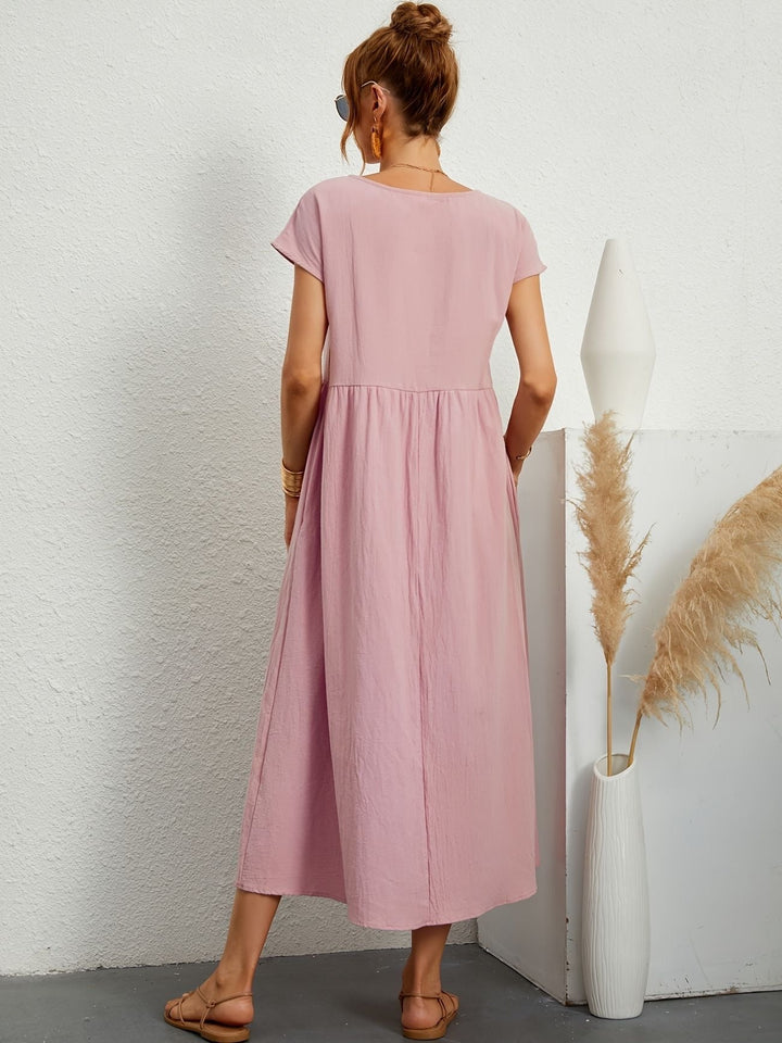 Comfortabele damesjurk midi met korte mouwen, perfecte pasvorm, geschikt voor warme zomerdagen.