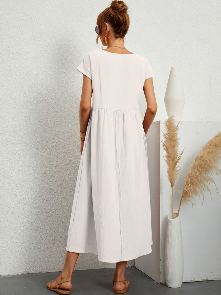 Lichtgewicht dames midijurk, korte mouwen, comfortabele pasvorm, ideaal als elegante zomerjurk.