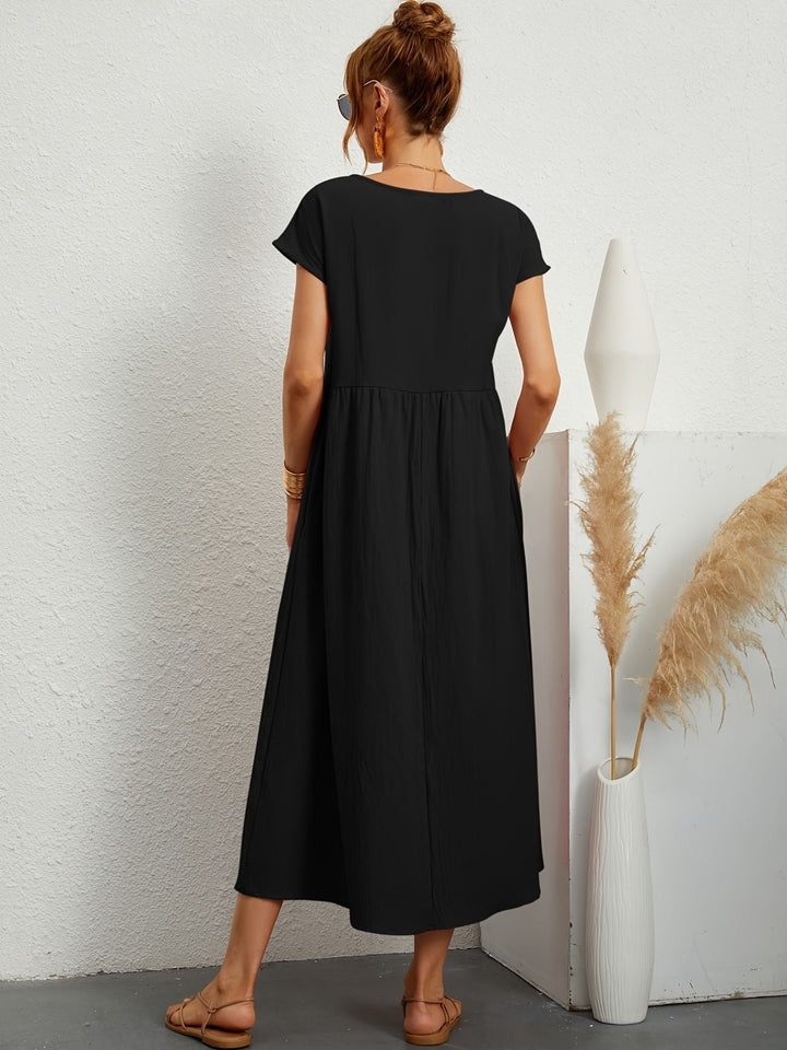 Trendy A-lijn midijurk voor dames, korte mouwen, combineert comfort met een casual-elegante stijl.