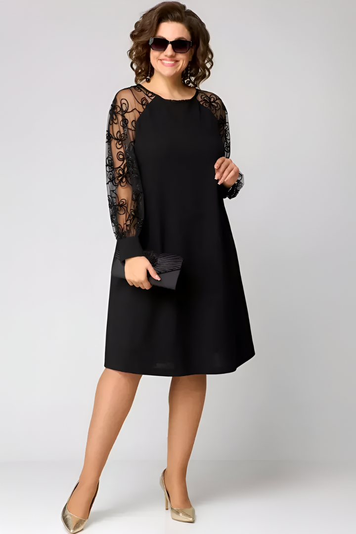 Zwarte dames midijurk met elegante mouwen en flatterende A-lijn, perfect voor galas en feesten.