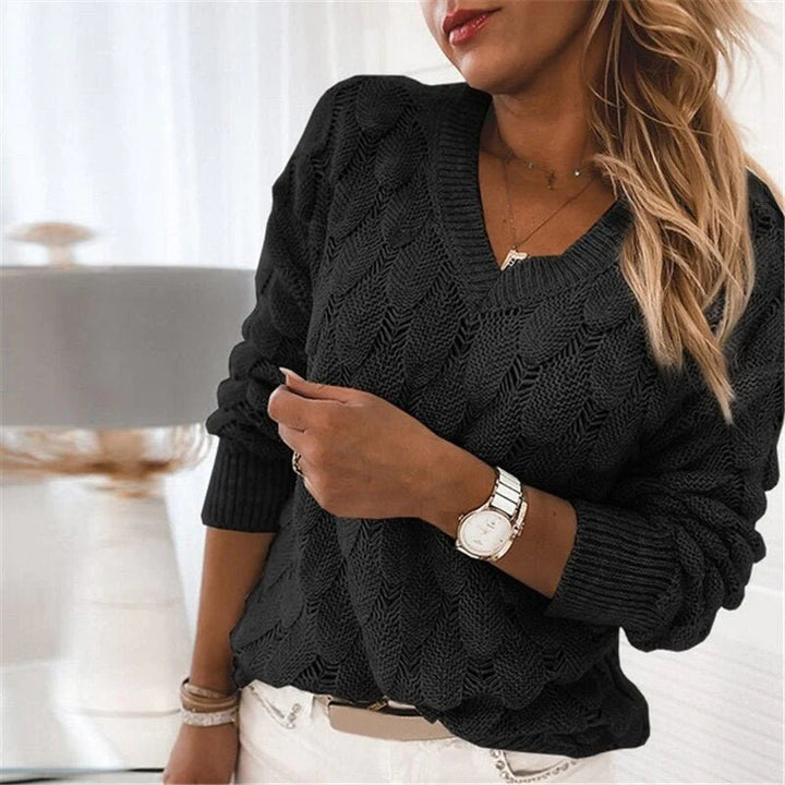 Zwarte dames sweater DoortjesSweater, modieuze pullover voor comfort en een tijdloze stijl.