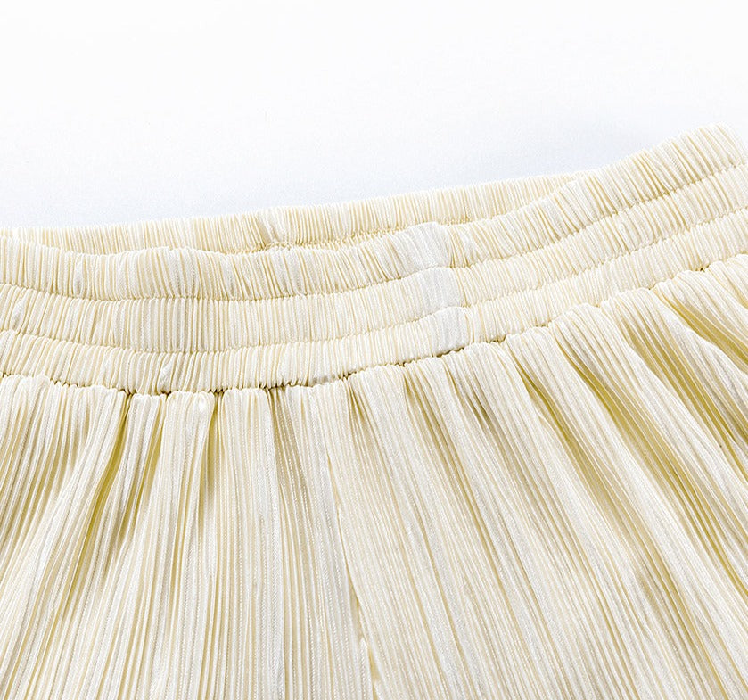Detail van de zachte, ademende stof van het Evita dames ensemble; comfortabel voor een premium gevoel.