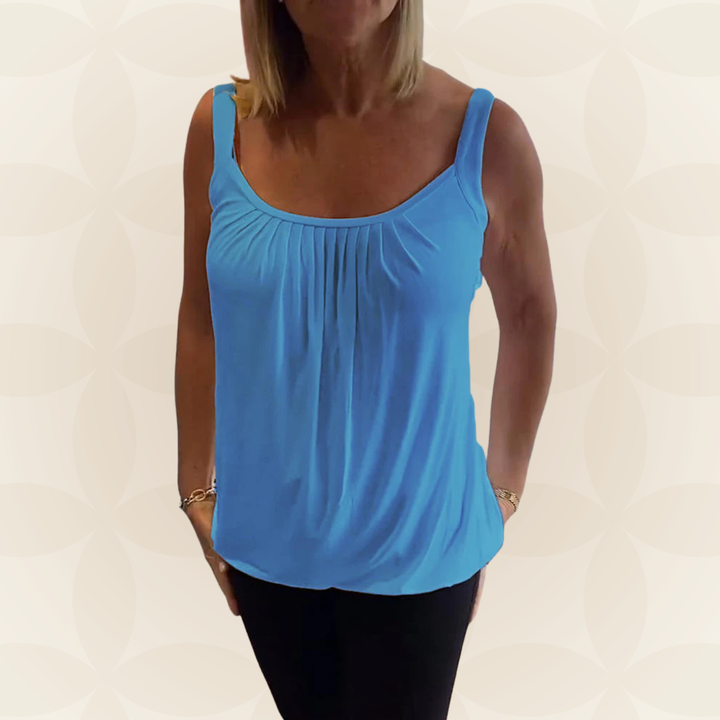 Veelzijdige dames mouwloze top, casual of elegant, met geplooide U-hals en relaxte fit.