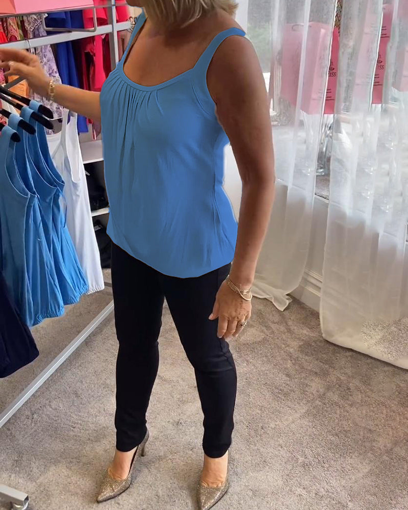 Stijlvolle dames top: mouwloos, geplooide U-hals, relaxte pasvorm. Perfecte basis top.