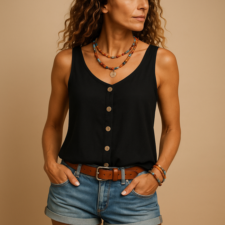 Modieuze dames kleding: chique mouwloze top met V-hals en subtiele knoopjes, perfect voor de zomer.