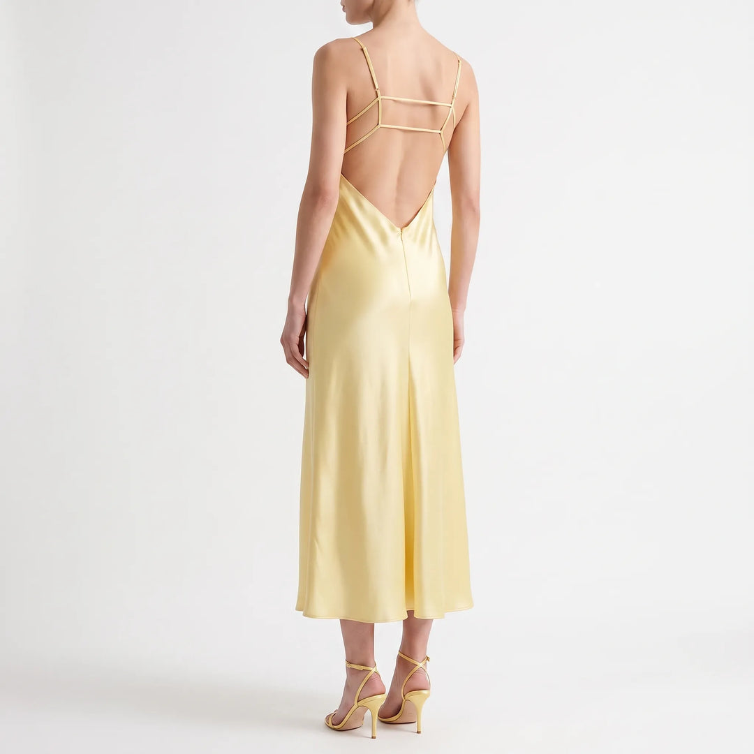 Roze mouwloze slipjurk voor dames, een stijlvolle midi-jurk met V-hals voor elegante avonden.