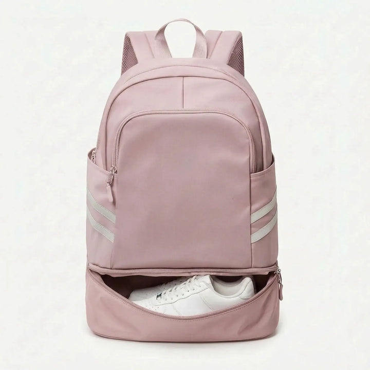 Ruime dames dagrugzak, ideaal als reistas, met aparte vakken voor schoenen en kleding, voor perfecte organisatie.