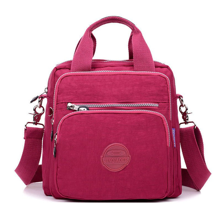 Duurzame nylon dames tas, 3-in-1 waterdicht en perfect voor reizen of werk.