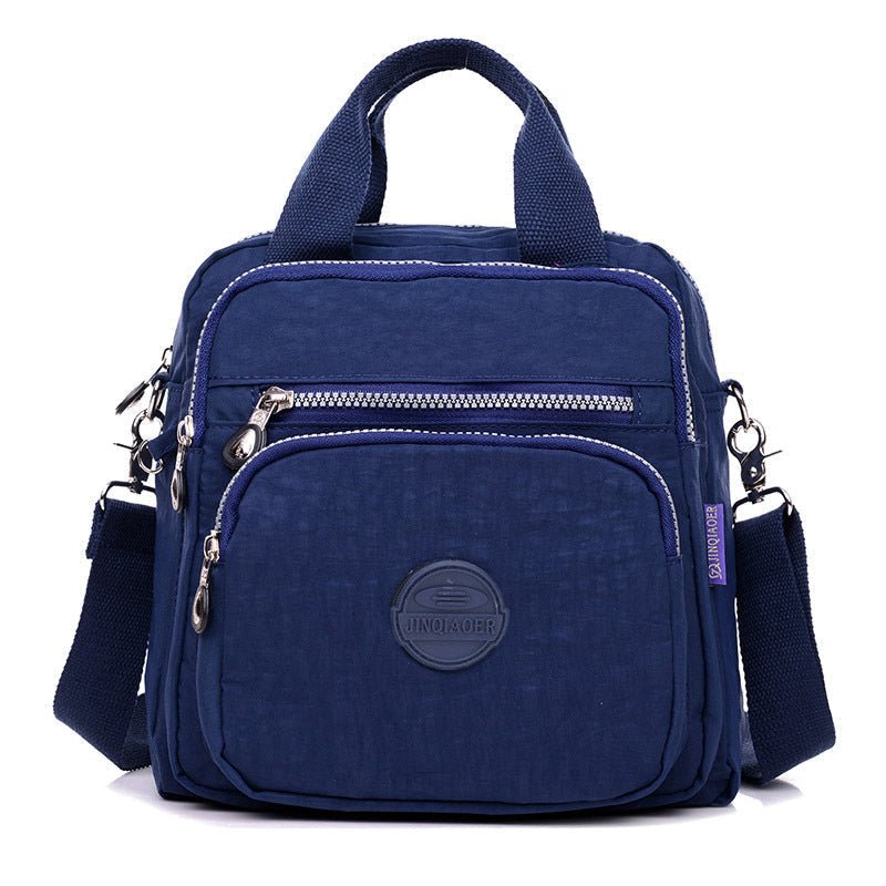 Dames reistas van waterdicht nylon, multifunctioneel als schoudertas of crossbody tas.