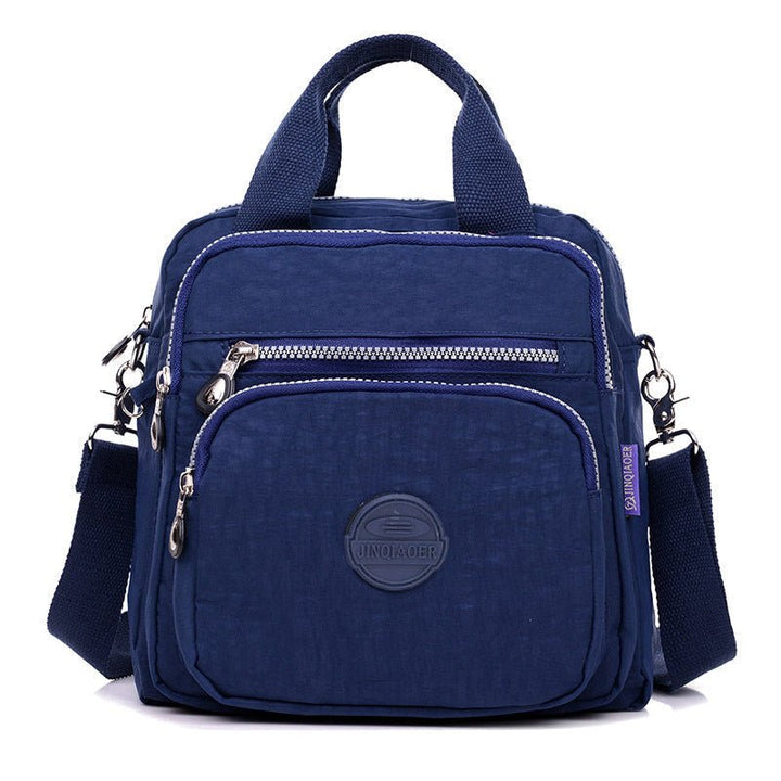 Dames reistas van waterdicht nylon, multifunctioneel als schoudertas of crossbody tas.