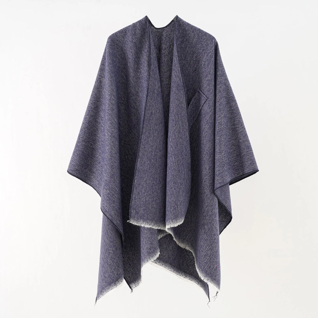 Retro damesponcho in kasjmier look, perfect voor herfst en winter warmte.