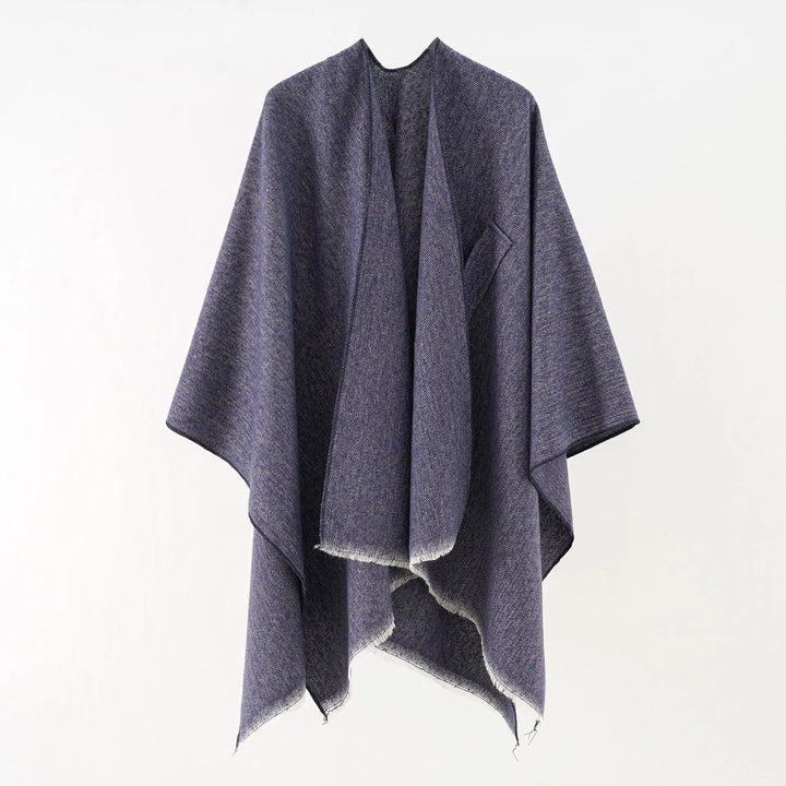 Retro damesponcho in kasjmier look, perfect voor herfst en winter warmte.