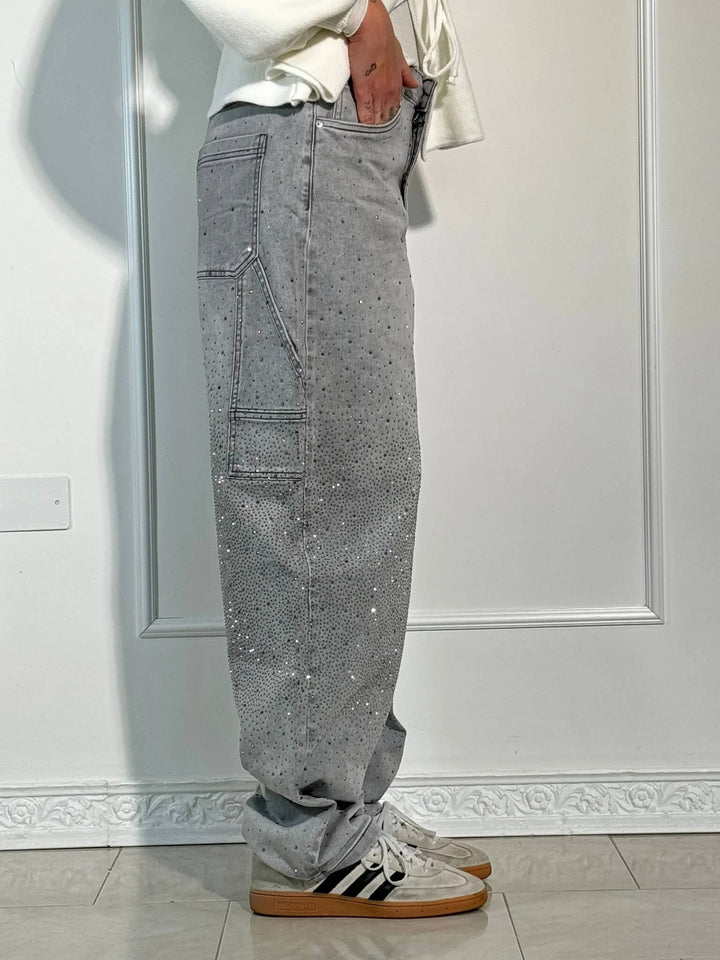 Festival ready: dames wide leg jeans met sprankelende glitter en rhinestone accenten.