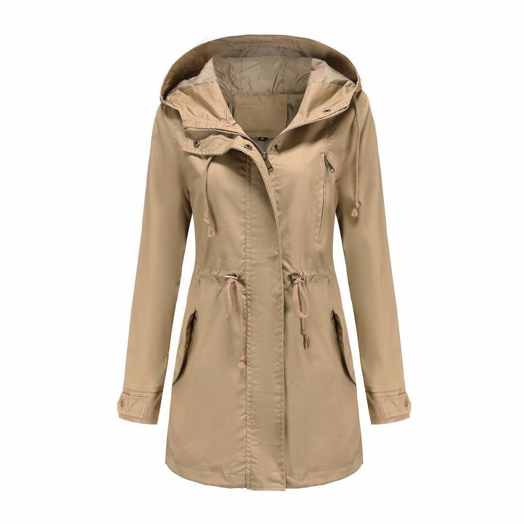 Lange dames trenchcoat, elegant en functioneel. Stijlvolle winddichte jas voor koude dagen.