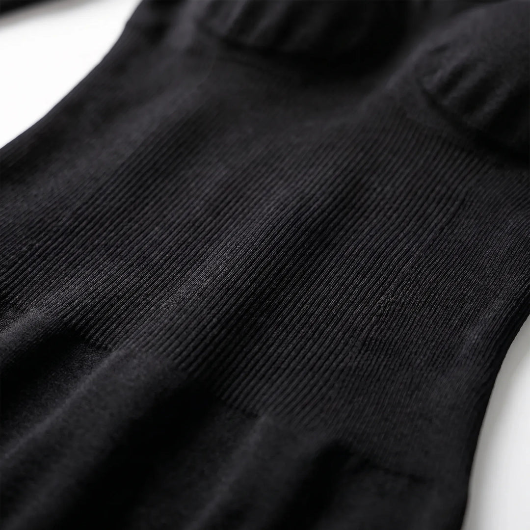 Corrigerende damesbody met lange mouwen, naadloos ontwerp voor een gladde look onder kleding.