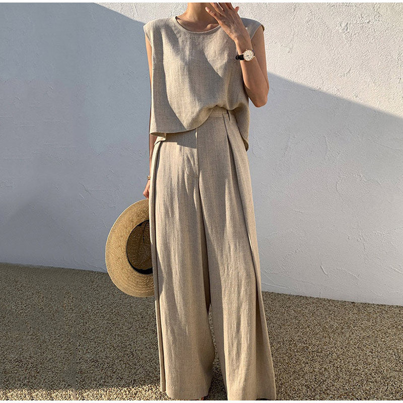 Dames set: elegante top met ronde hals & wijde pijpen broek. Comfortabele tweedelige zomerkleding voor casual chic.
