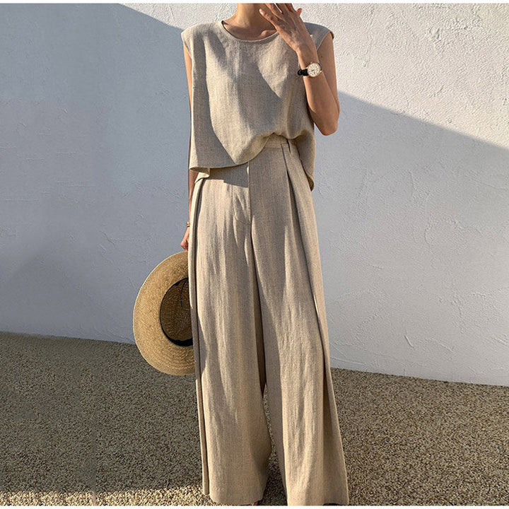 Dames set: elegante top met ronde hals & wijde pijpen broek. Comfortabele tweedelige zomerkleding voor casual chic.