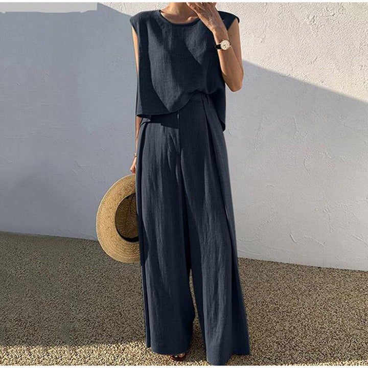 Complete dames set: elegante top & wijde pijpen broek. Perfecte modieuze vakantie outfit met comfortabele pasvorm.