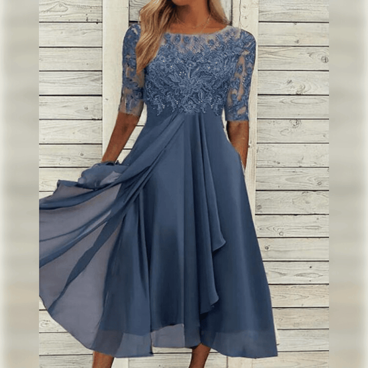 Elegante dames kanten jurk voor een stijlvolle look. Perfect als feestjurk of zomerjurk.